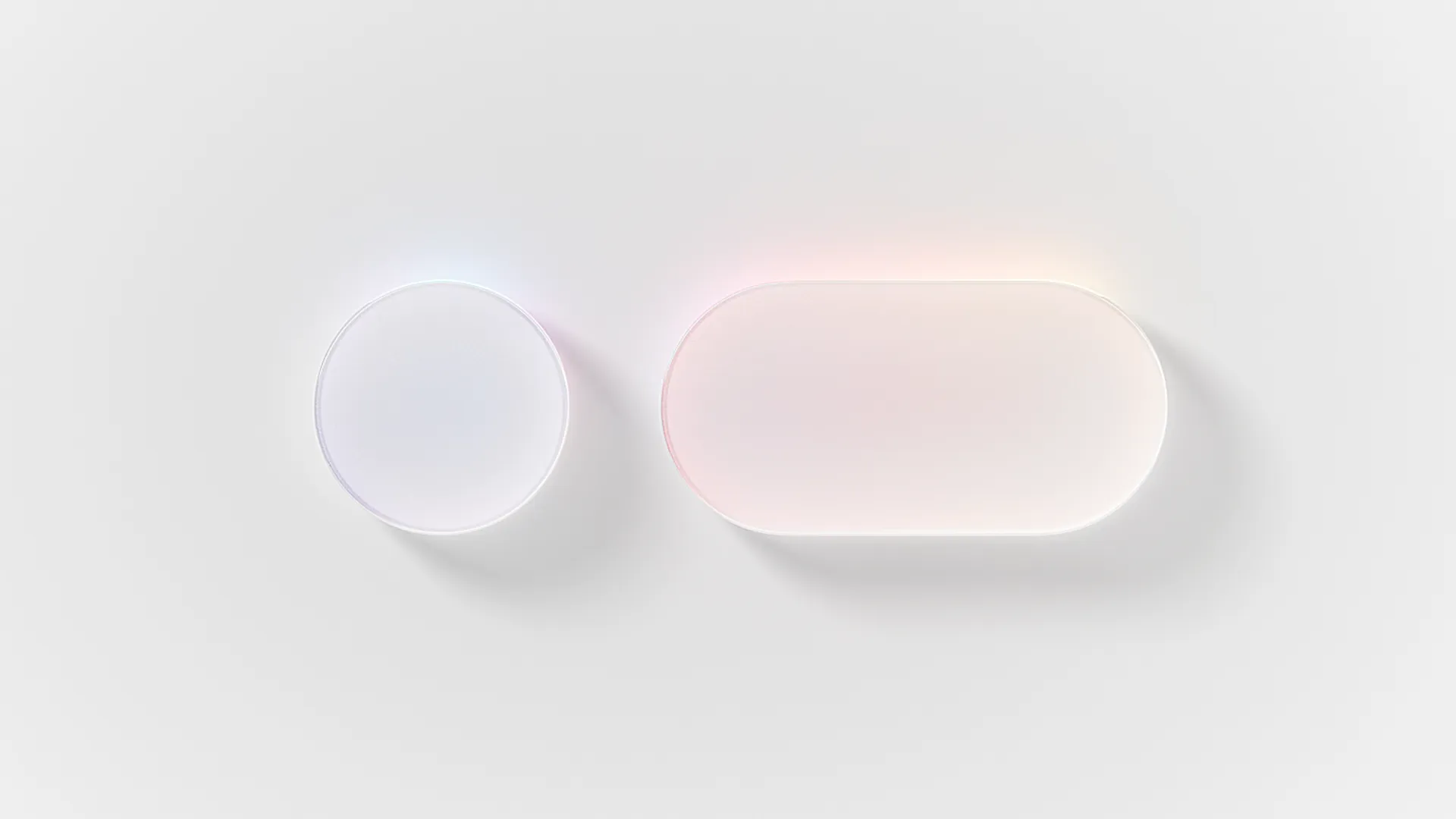 Two soft, rounded white UI shapes, a circle and a pill toggle, floating on a near-white background with faint pastel light at the edges, evoking an ambient interface that nearly disappears