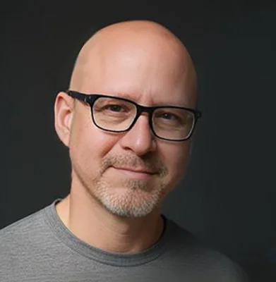 Justin Bartak, Chief AI Officer and AI-native product leader